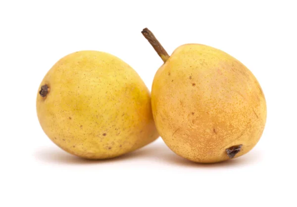 Kleine gele peren geïsoleerd op wit — Stockfoto
