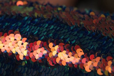 Farklı pul açıları olan çift taraflı pullu kumaşın makro arka planı 