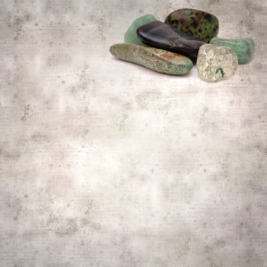 Yarı değerli taşları olan şık desenli eski kağıt arka plan 