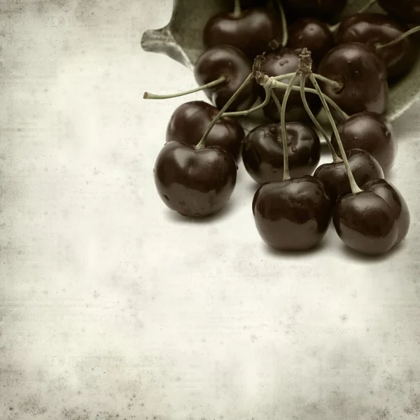 Textured old paper background  with cherries — Stock Photo, Image