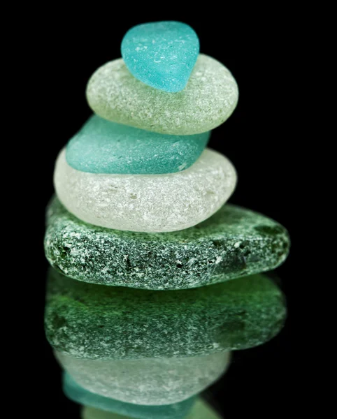 Sea glass pieces on black — Stock Photo, Image