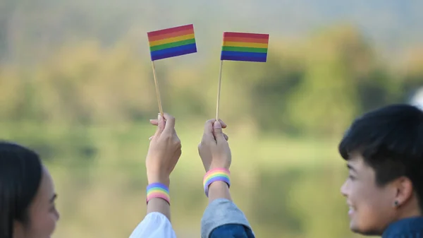 Cropped Shot Young Lgbt Lesbian Couple Showing Rainbow Flag While — Stockfoto
