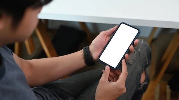 Close View Man Holding Smarphone While Sitting Workspace Crossed Legs — стоковое фото