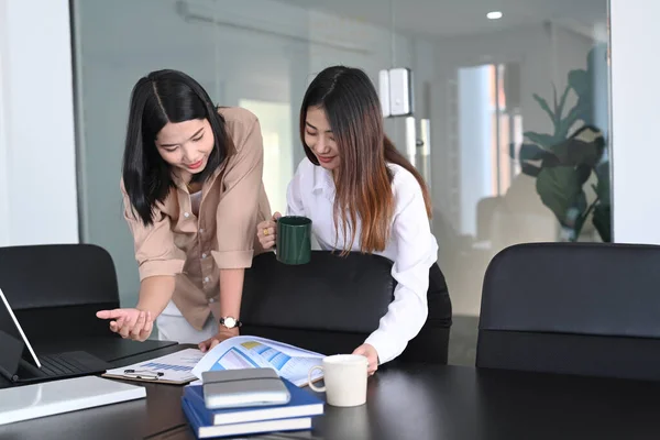 Two Young Businesswoman Reading Analyzing Report Office — Stock Photo, Image