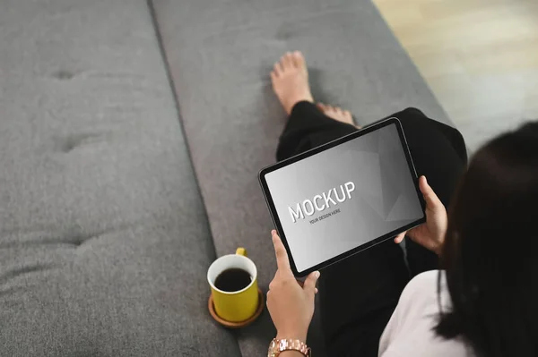 Young Female Relaxing Mock Tablet While Lying Couch Living Room — Photo