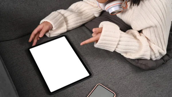 Cropped Shot Girl Using Digital Tablet While Lying Sofa Home — Stockfoto