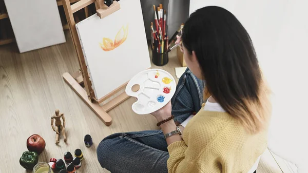 Young Female Artist Palette Her Hand Painting Canvas While Sitting — Stock Photo, Image