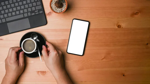 View Man Holding Cup Coffee Using Smart Phone Wooden Table — Stock Photo, Image