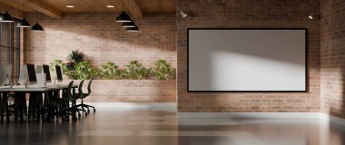 Modern endüstriyel ofis köşesi büyük boş bir çerçeve, bilgisayar çalışma masası sırası ve tuğla duvar çalışma alanı 3D..