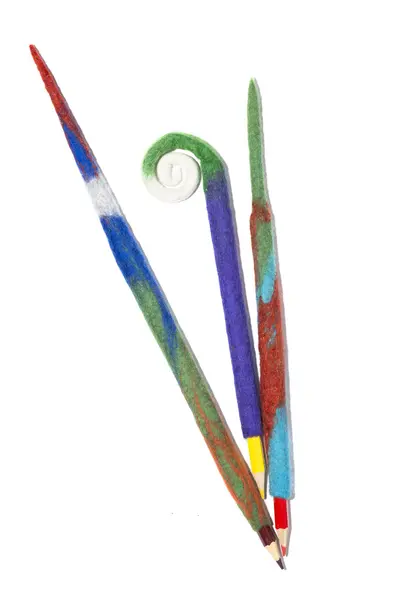 Pencils in a case of felted wool on a white background — Stock Photo, Image