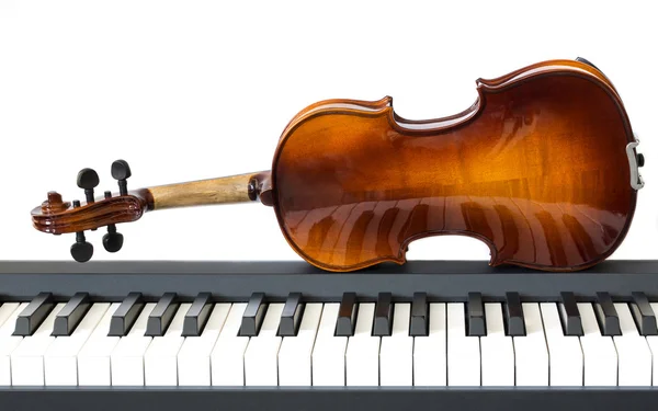 Piano keys and violin on a white background — Stock Photo, Image