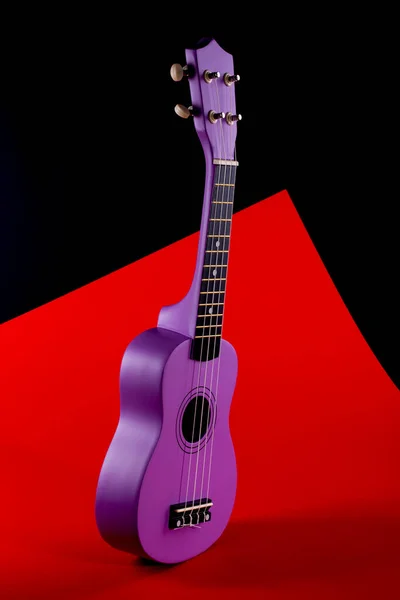 Four String Ukulele Guitar Red Black Background — Stock Photo, Image