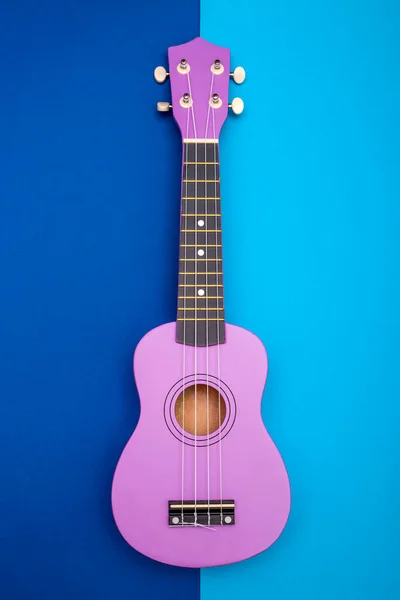 Four String Ukulele Guitar Blue Background — Stock Photo, Image