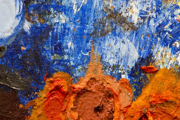 Abstraktní pozadí olejových barev na paletě umělce — Stock fotografie