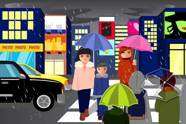 La gente en la ciudad caminando bajo la lluvia — Vector de stock