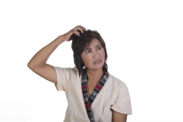 Confused woman scratching her head — Stock Photo, Image