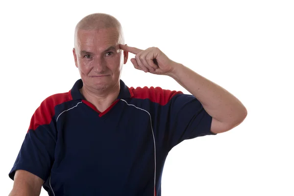 Hombre calvo inteligente apuntando a su cabeza — Foto de Stock