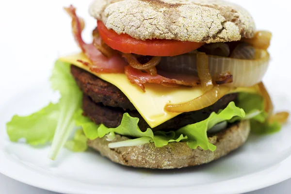 Cheeseburger with bacon — Stock Photo, Image