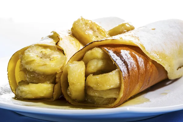 Panquecas ou crepes com banana — Fotografia de Stock