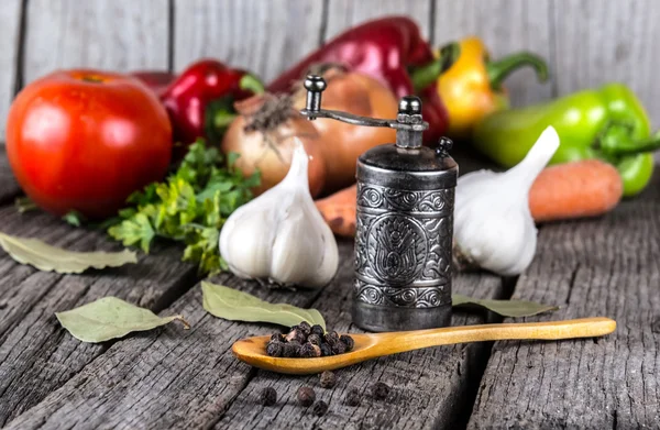 Organic food background Vegetables pepper mill