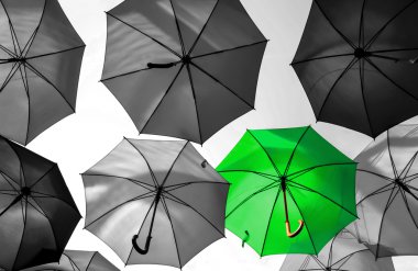 umbrella standing out from the crowd unique concept clipart