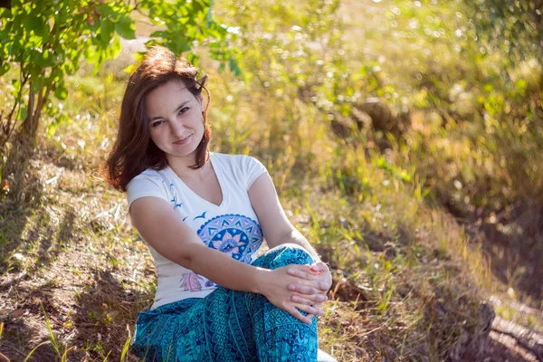 The smiling young woman — Stock Photo, Image