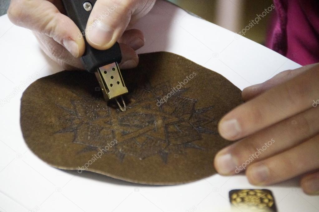 Pyrography on a skin