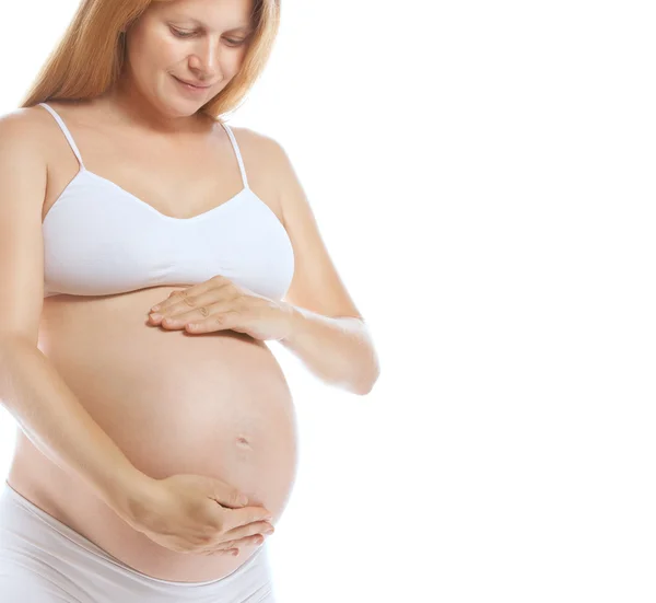 Pregnant woman studio shot on white — Stock Photo, Image