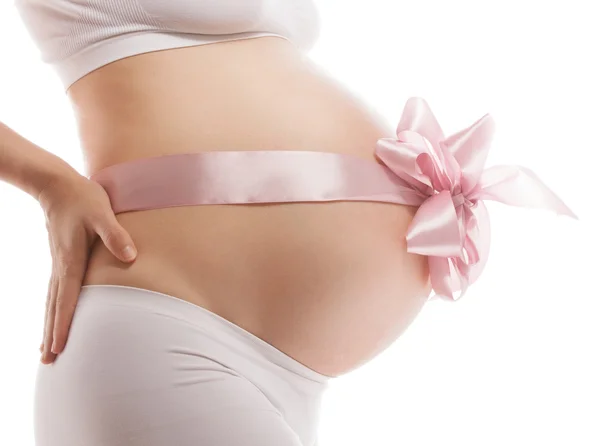 Zwangere vrouw studio opname op wit — Stockfoto