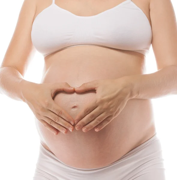 Gravid kvinna studio skott på vit — Stockfoto