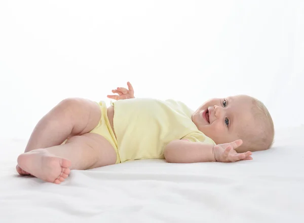 Baby lying down isolated on white — Stock Photo, Image