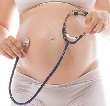 pregnancy belly closeup studio shot