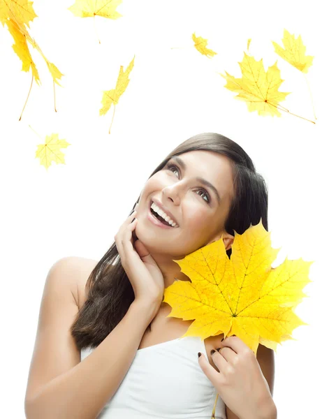Woman beauty closeup portrait with yellow leave face skin — Stock fotografie