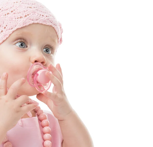 Little baby girl with baby's dummy — Stock Photo, Image