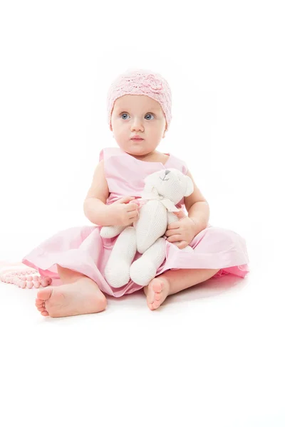 Little baby with teddy bear Stock Picture