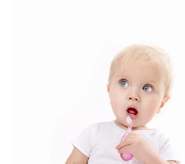 Little baby brushing teeth — Stock Photo, Image