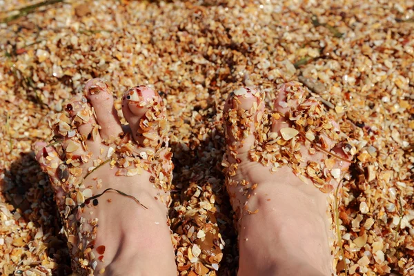 Feet over the sea beach — Stock Photo, Image