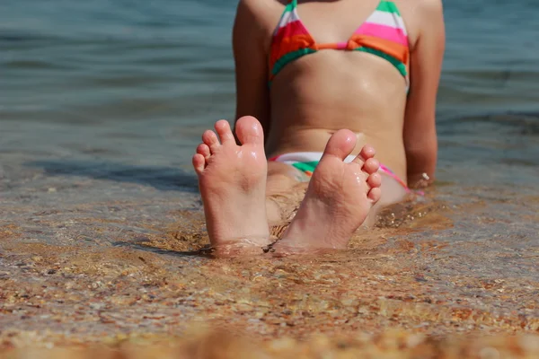 Kid's feet in the Black Sea — Stock Photo, Image