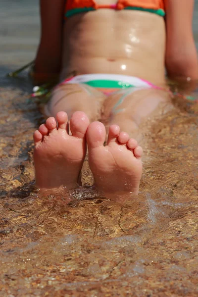 Kid's feet in the Black Sea — Stock Photo, Image