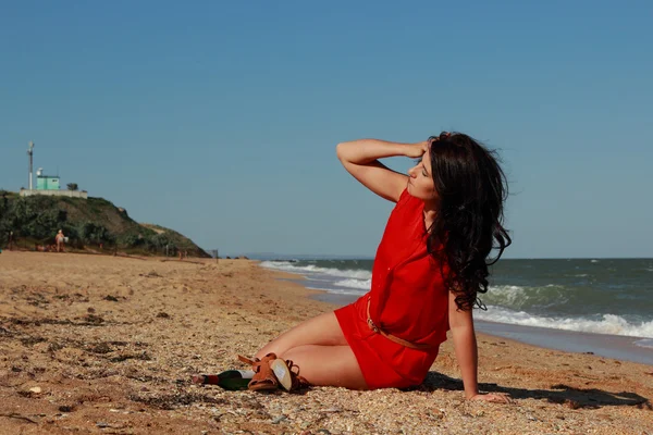 Lady in red over the Black Sea — Stock fotografie