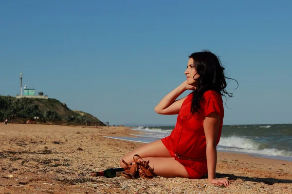 Lady in red over the Black Sea — Stock Photo, Image