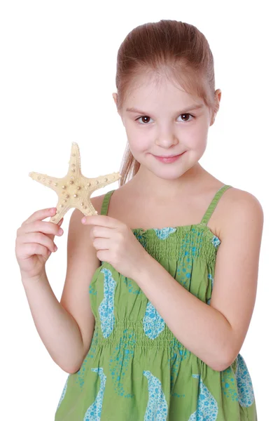 Little girl holding marine life — Stock Photo, Image