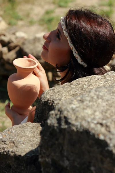 Lovely woman in ancient town — Stock Photo, Image