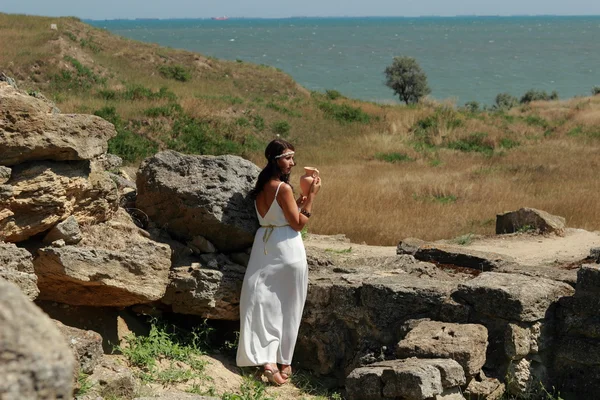 Woman in ancient town — Stock Photo, Image