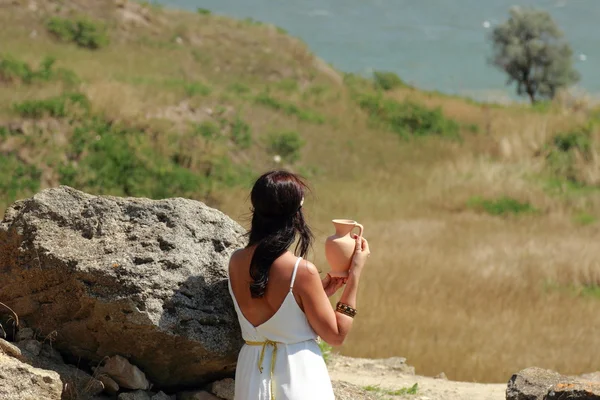 Woman in ancient town — Stock Photo, Image