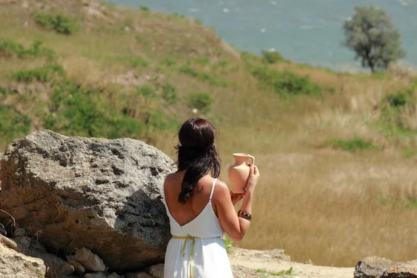 Woman in ancient town — Stock Photo, Image