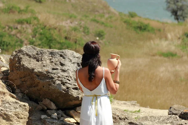 Woman in ancient town — Stock Photo, Image