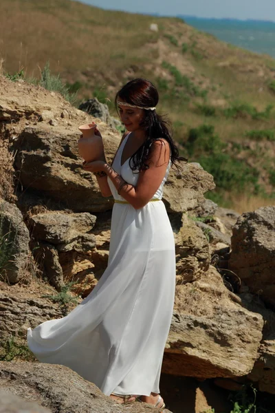 Woman in ancient town — Stock Photo, Image