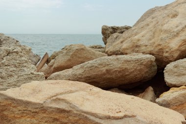 Deniz taşı yüzeyi, dalga isabet kahverengi deniz taşı yüzey eğrisi doku