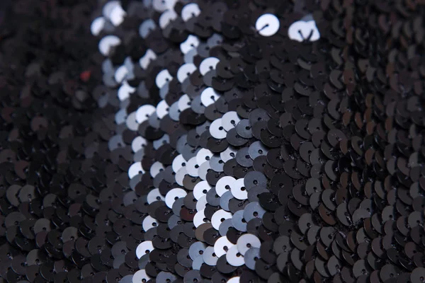 Black sequins texture background